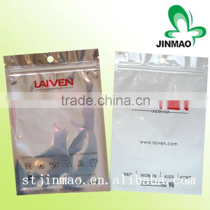 Clothing packaging bag with one side clear and foil inside