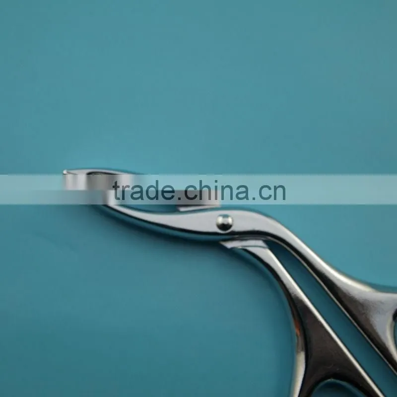 Bent head scissor style tweezers