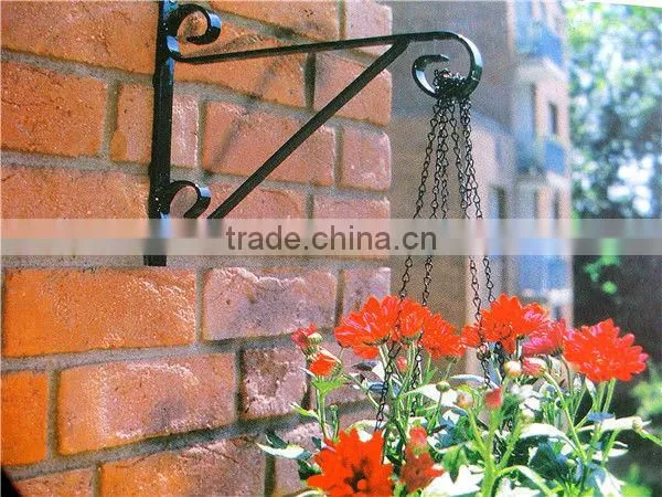 antique metal flower basket hanging hook in wall