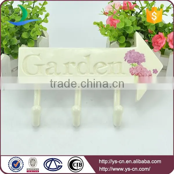 pastoral style garden sign with hook