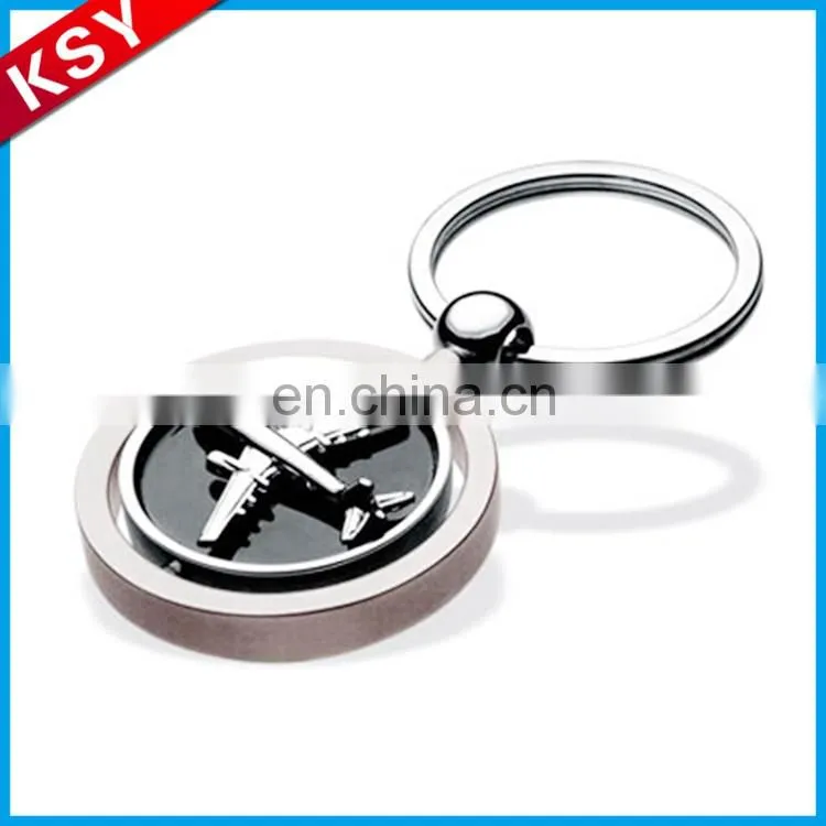 polished nickel key shape keychain