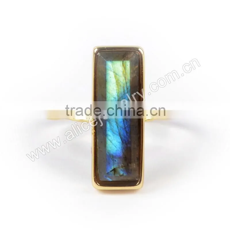 Natural faceted rectangle labradorite gemstone set into a 18k gold bezel ring