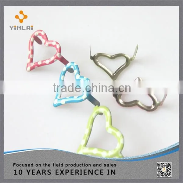 Metal heart shaped brads