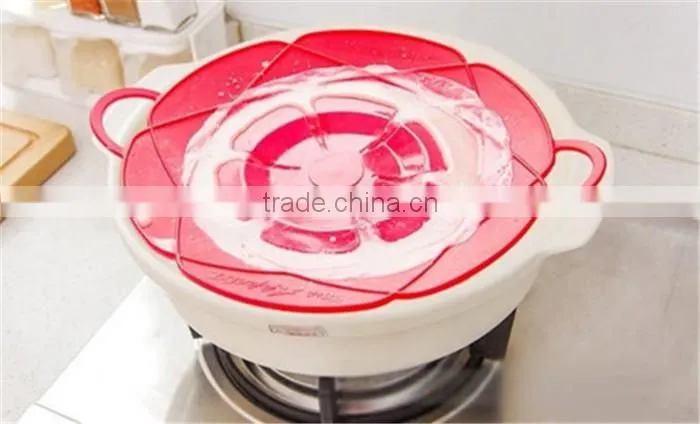 Silicone spill stopper Silicone Lid Stops Pots and Pans Spill Stopper 11.5" Silicone Pot Lid silicone spill stopper