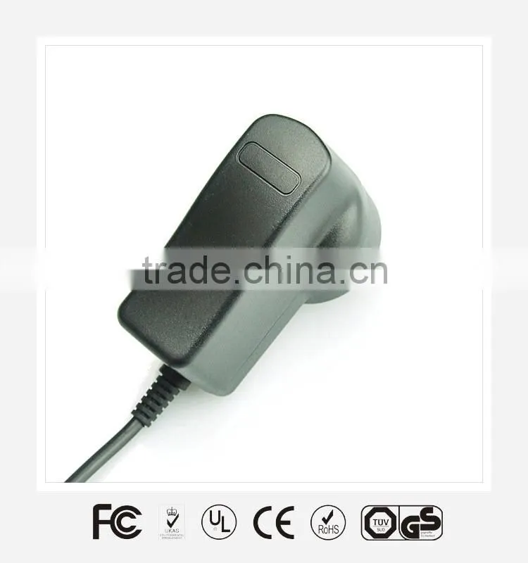 Input AC100-240V Output 9V2A direct plug-in 18W power adapter