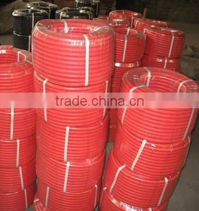 red plastic water pipe roll