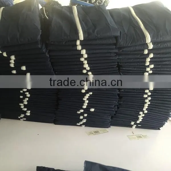 Disposable PP nonwoven lab coat with collar without pocket white 50grams Chinese supplier
