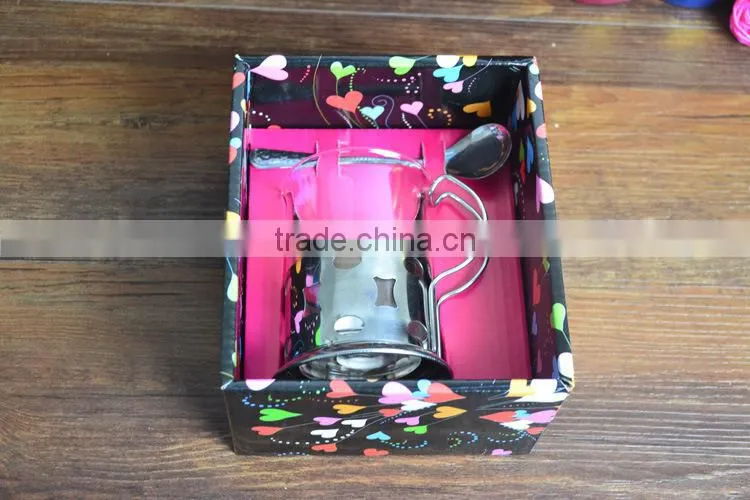 Glass coffee mug with stainless steel base handle