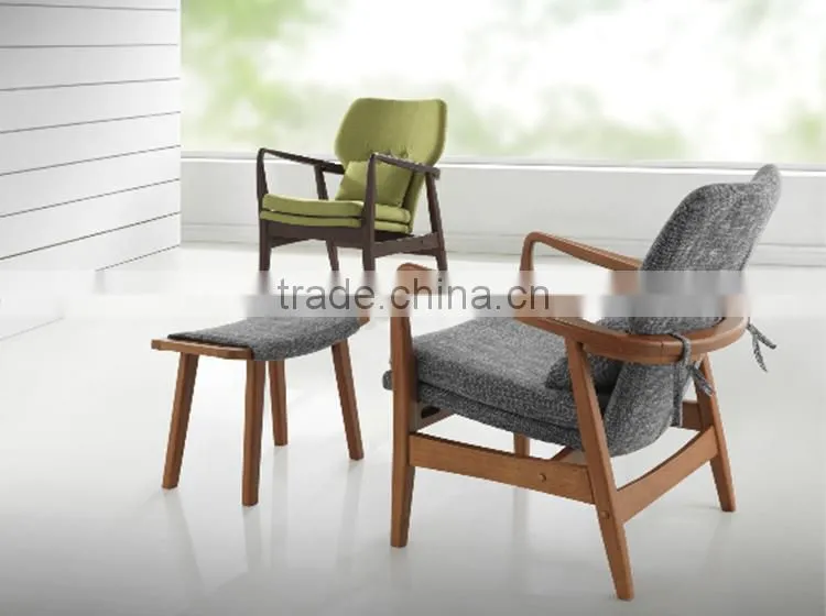 Mid-century walnut finished modern green fabric upholstered club chair with sleek polished wood arms