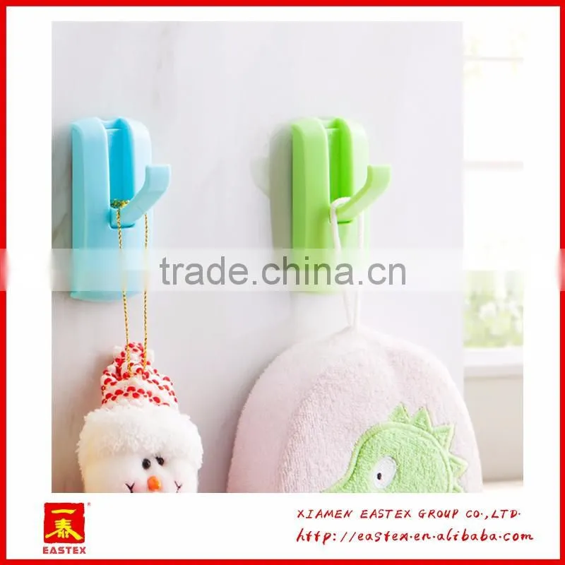 Plastic hook with adhensive tape