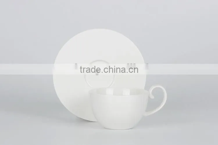 delicate fine porcelain coffee cup with saucer