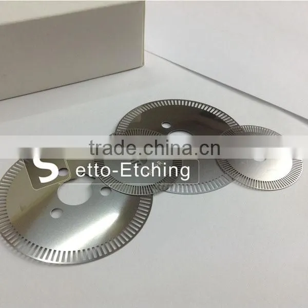 Chemical etching metal filter disk manufacture