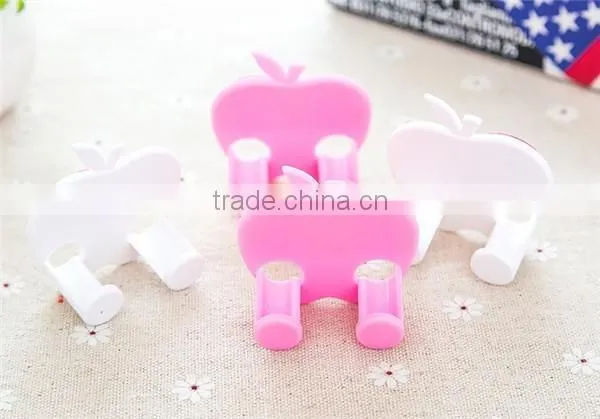 Wall plug holder,plug hanger