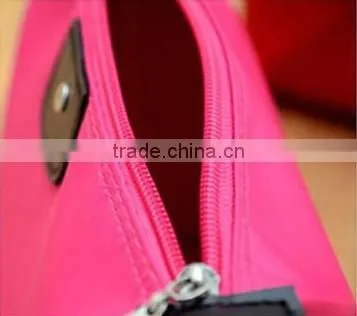 YIWU RODA 100%nylon multicolor optional dumpling shape cosmetic bag