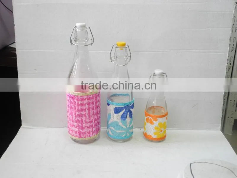 glass milk juice bottle with metal clamp lid and woven belt coating