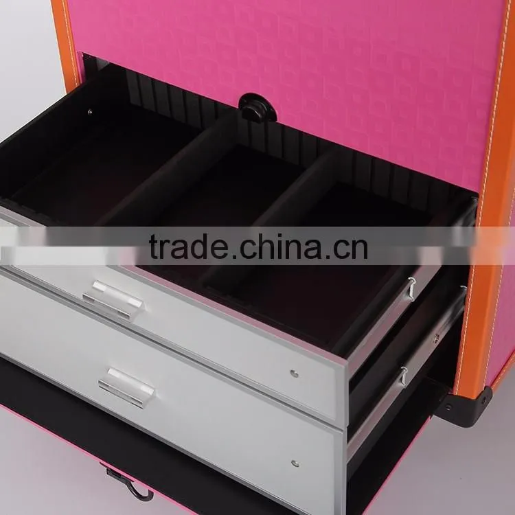 Pink rolling makeup case with trays