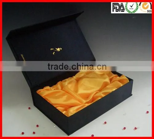 black box with CMYK printing and gold logo lamination and ribbon