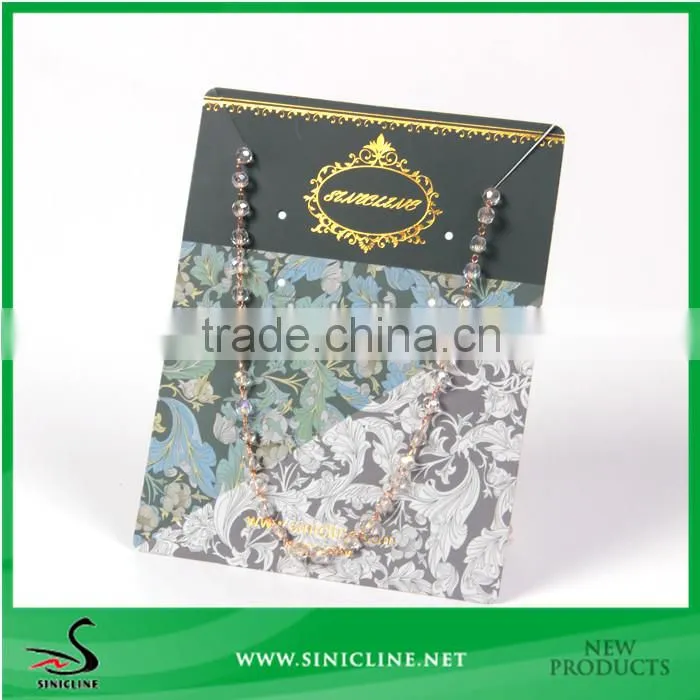 Sinicline custom made necklace card with gold stamped logo