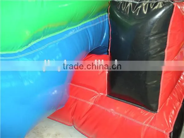 Inflatable bouncy castle with water slide