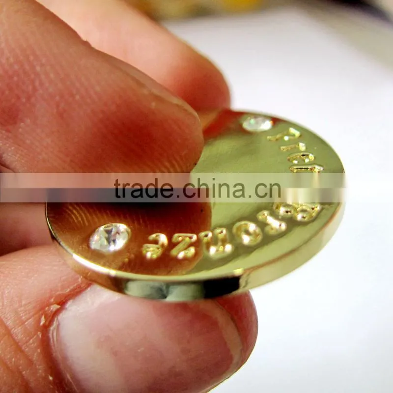 a crystal gold color jeans button