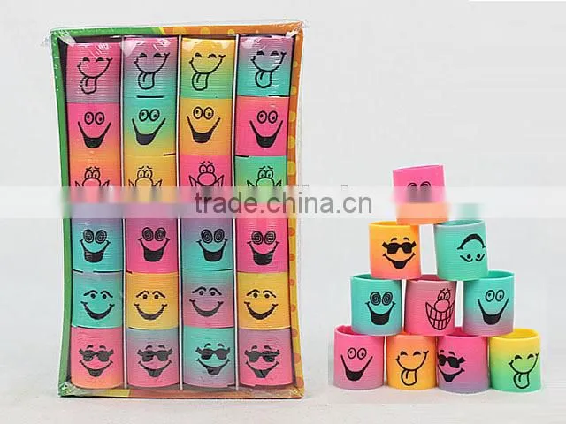 hot sale colorful magic rainbow spring with funny face kids educational toys/ plastic rainbow circle