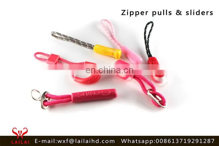 Solid zip puller design for brands