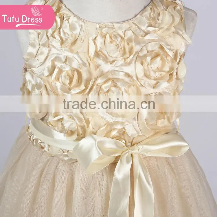 The ivory color girls boutique dress with fluffy feather