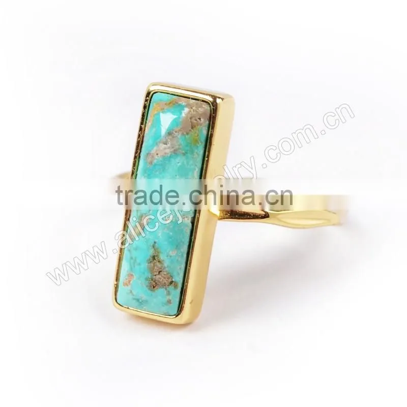 Natural blue turquoise set into a 18k gold bezel