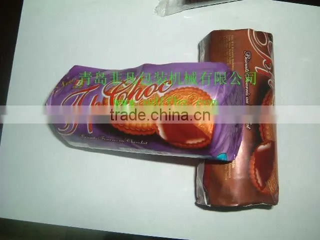 Envelope type biscuit wrapping machine