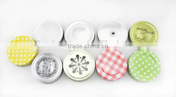 clear cylinder glass jam jar with metal lid with platic straw