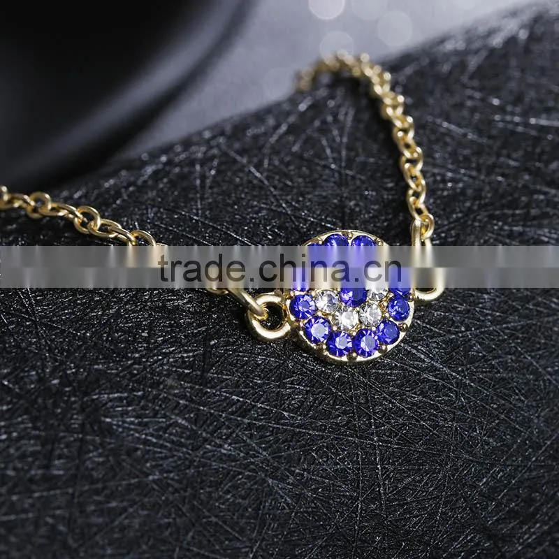 rhinestone evil eye charm gold chain bracelet