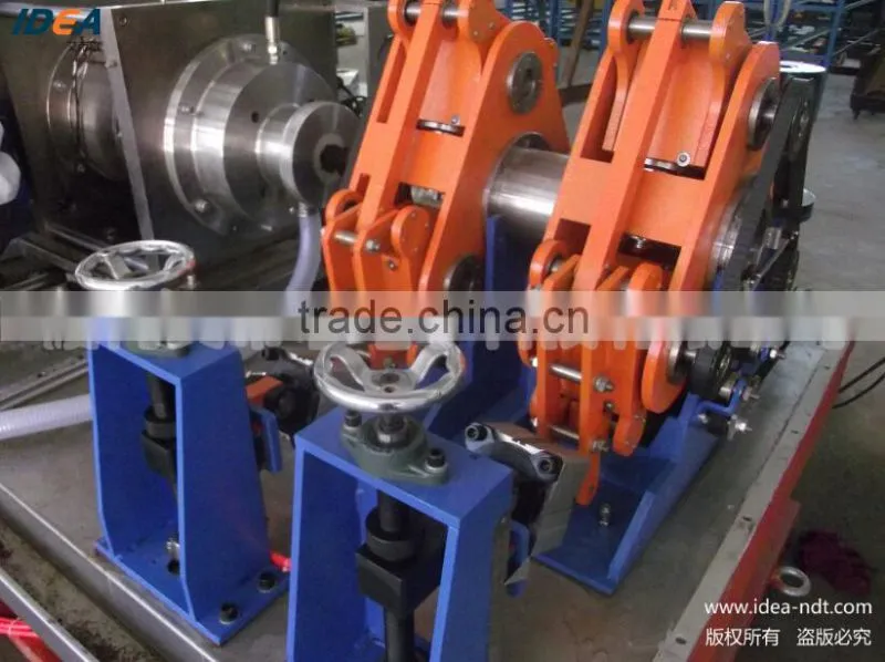 Rotary ultrasonic testing system for high speed tube testing directly in the production line
