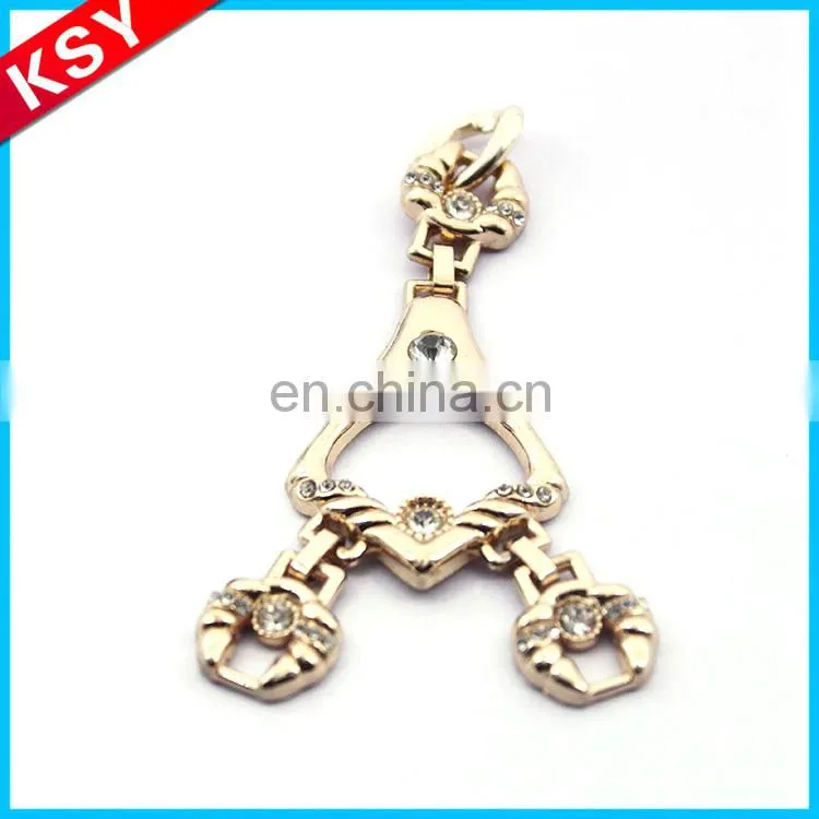 polished nickel key shape keychain