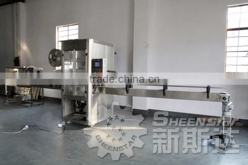 Automatic Jar Shrink Sleeve Label Packing Equipment / Machine / Machinery