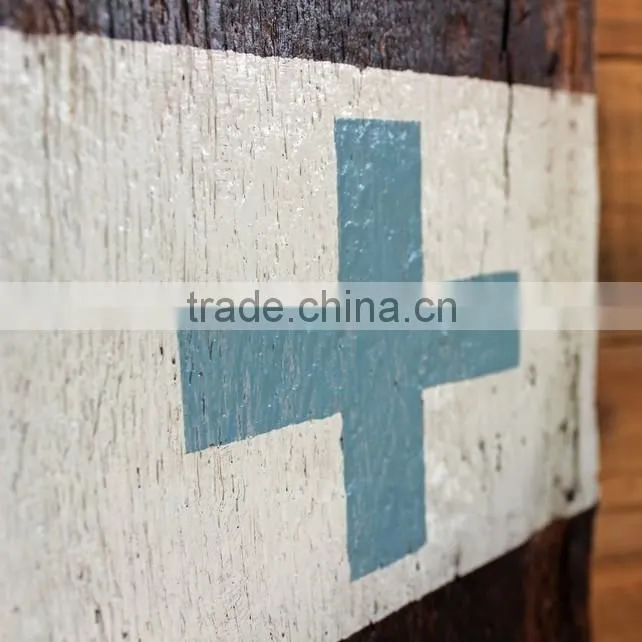 older aged wooden door stop