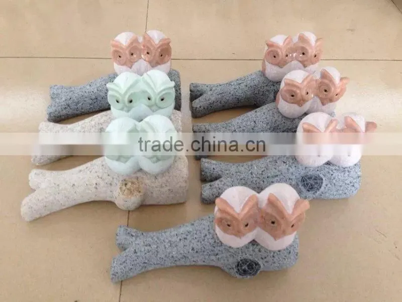 2 couple owl sculpture on tree