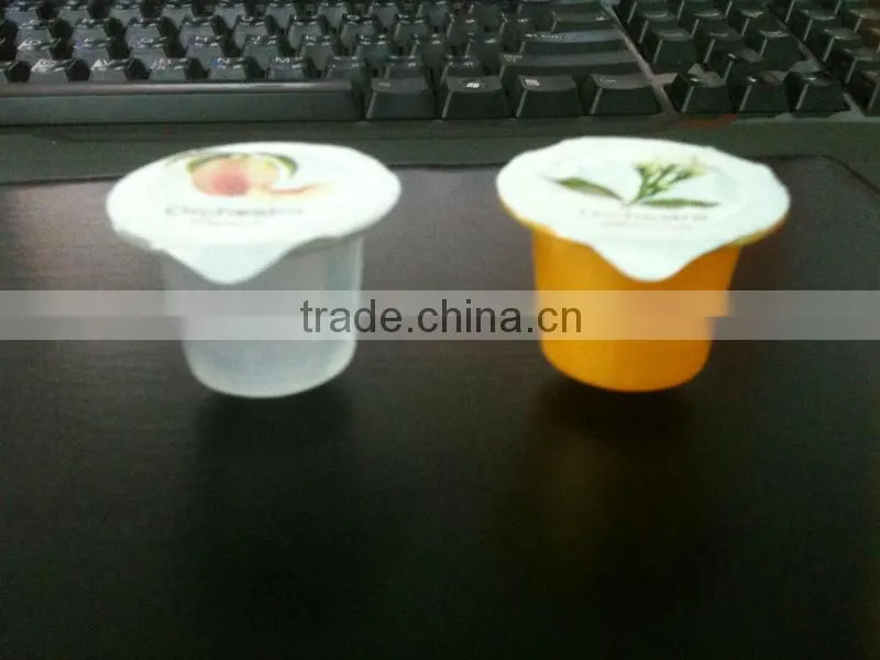 Automatic rotary cup filling and sealing machine
