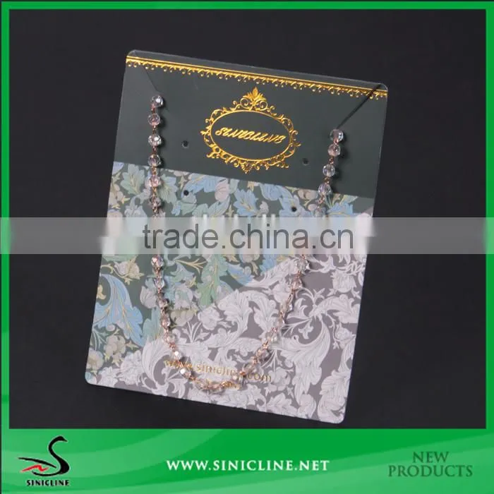 Sinicline custom made necklace card with gold stamped logo