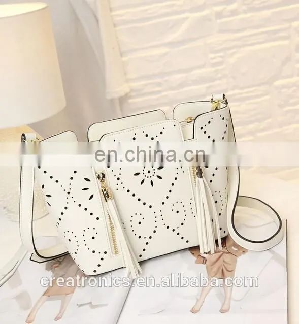 CR high reputation manufacture handbags latest model tassel bag long strap hollow pattern shoulder bag handmade leather bags