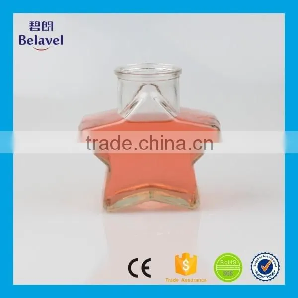 Xuzhou factory supply five star shaped cheap clear glass bottle