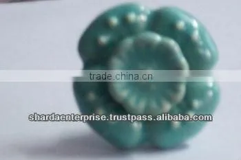 ceramic white knob with green circles