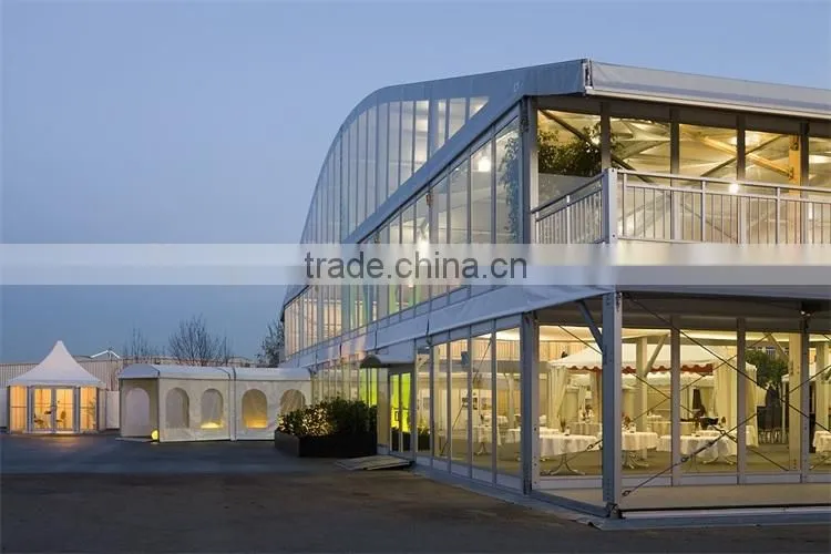Double decker, curved roof, glass walls and flooring system