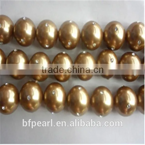 Cheap Price of 14mm Gold Shell Pearls Beads with 4 Crystal Beads for Sale