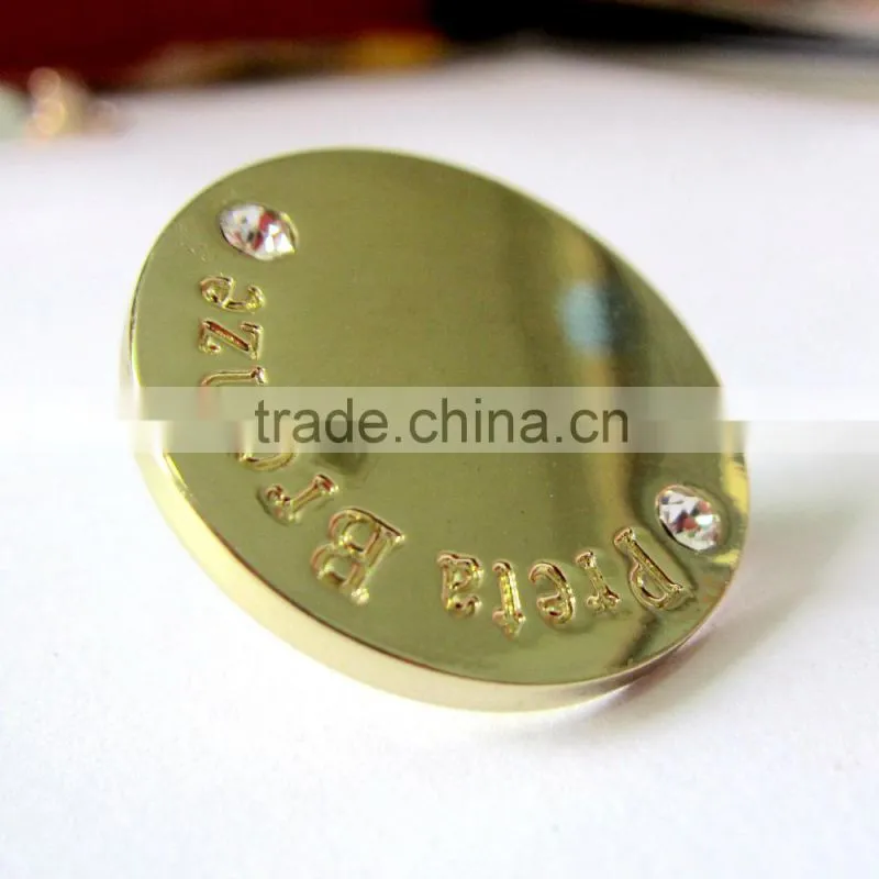 a crystal gold color jeans button