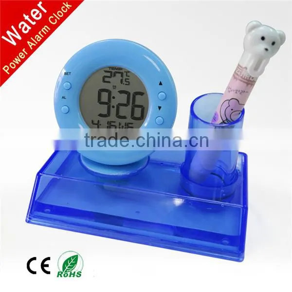 water power table alarm clock with pen holder