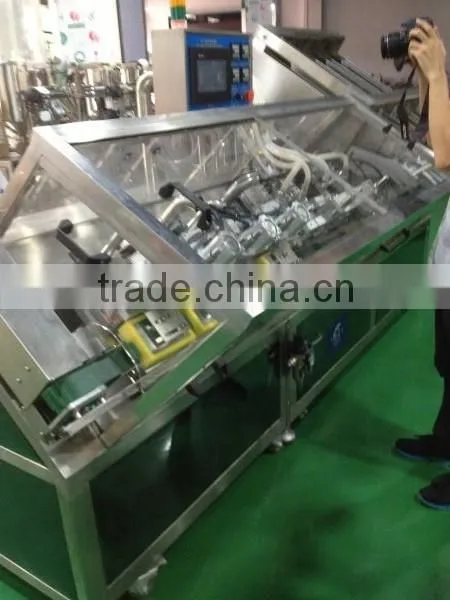 Full-automatic facial mask plastic bag filling sealing machine