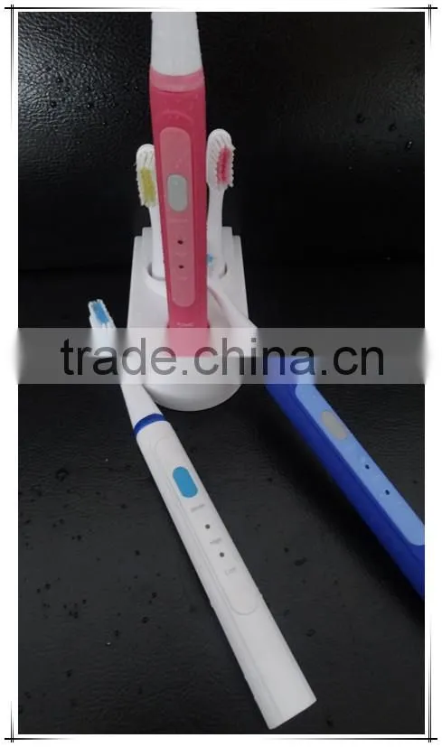 Sonic viberation electric toothbrush with three heads