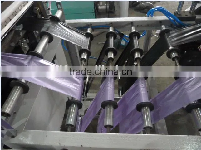 Manual coreless rolling bag machine
