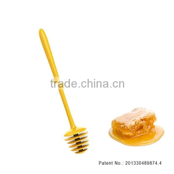 Silicone squirrel-and-pinecone honey dipper