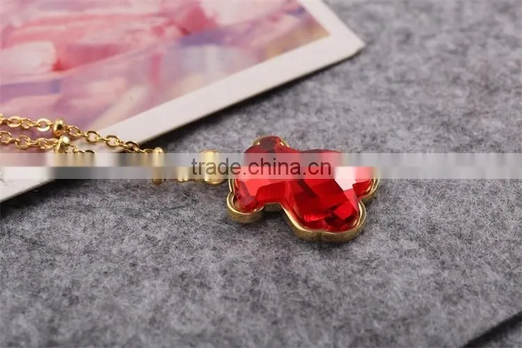 Guangzhou biggest wholesale fashionable gold long chain red crystal necklace with bear pendant